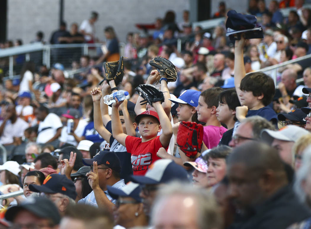 Las Vegas Aviators fans cheer as the team plays against Round Rock Express in "Reyes de Pl ...