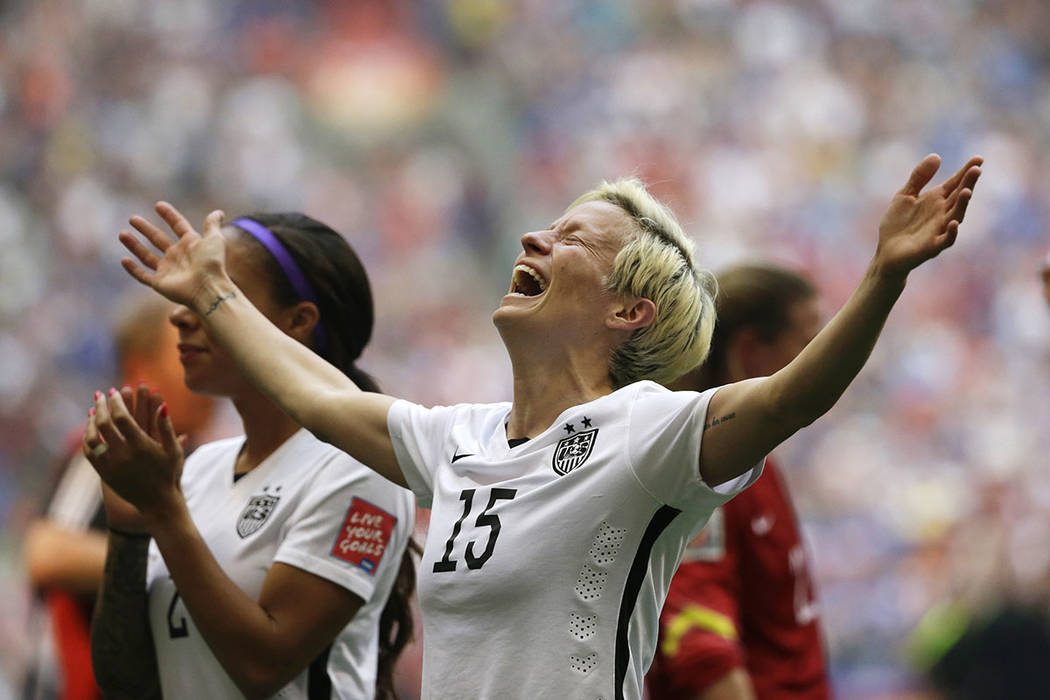 FILE - In this July 5, 2015, file photo, United States' Megan Rapinoe celebrates after the U.S. ...