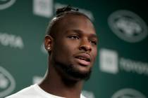 In this Tuesday, June 4, 2019, photo, New York Jets running back Le'Veon Bell speaks to report ...