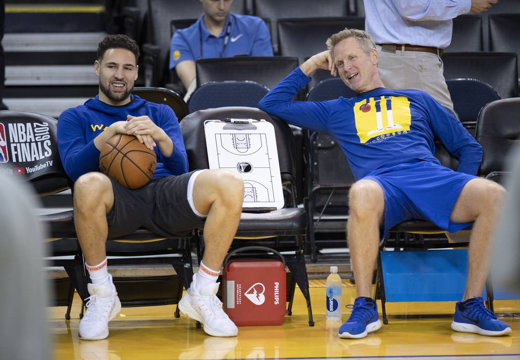 Golden State Warriors' Klay Thompson, left, and head coach Steve Kerr share  a laugh during prac … | Las Vegas Review-Journal