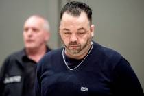 Former nurse Niels Hoegel, right, accused of multiple murder and attempted murder of patients, ...