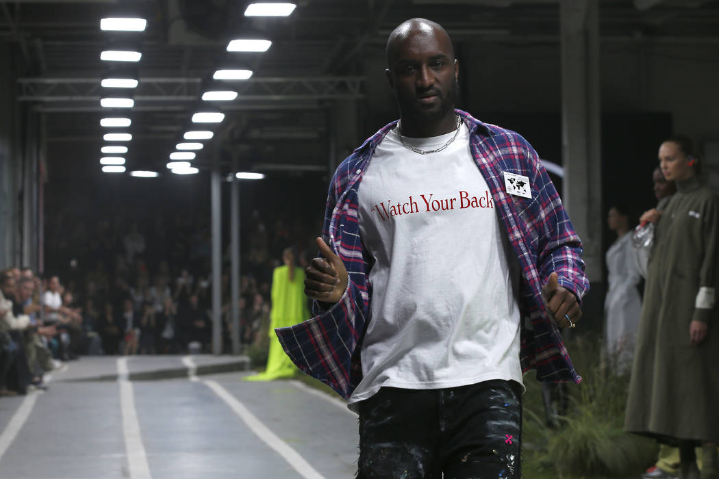 Designer Virgil Abloh accepts applause at the end of his the Off White Spring/Summer 2019 ready ...
