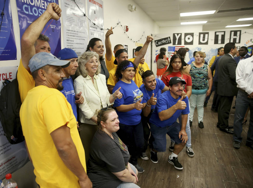 Rep. Dina Titus, D-Nev., poses with supporters after a news conference in Las Vegas Friday, Jun ...