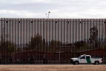 A U.S. Customs and Border Protection vehicle sits near the wall as President Donald Trump visit ...