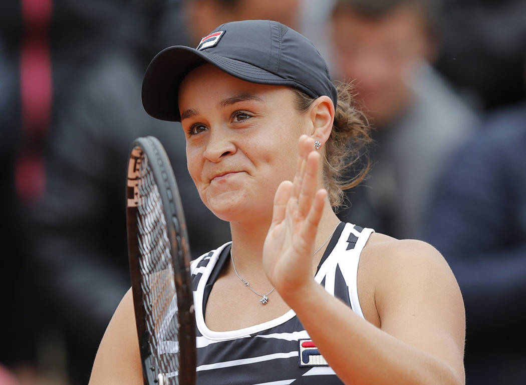 Australia's Ashleigh Barty celebrates winning her semifinal match of the French Open tennis tou ...