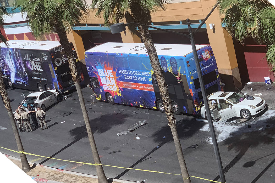 Police investigate a crash on Las Vegas Boulevard near Fremont Street in downtown Las Vegas on ...