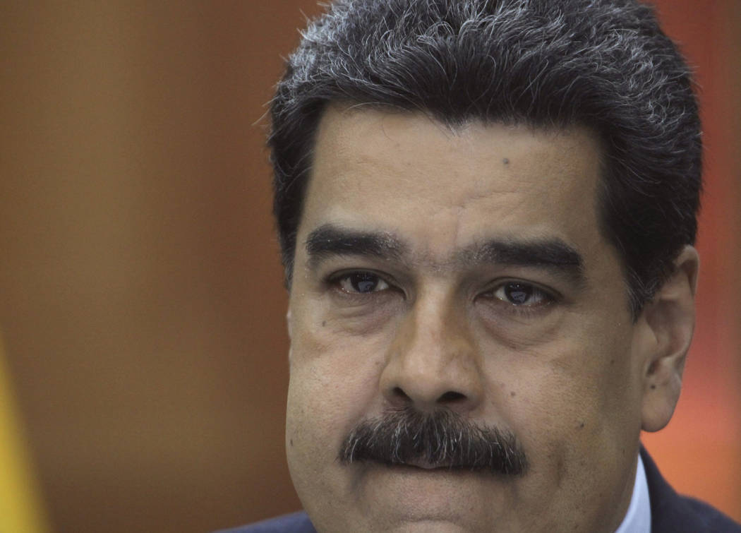 FILE - In this Jan. 9, 2019 file photo, Venezuela's President Nicolas Maduro holds a press conf ...