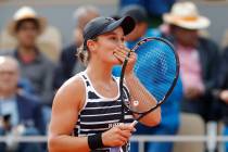 Australia's Ashleigh Barty celebrates winning her women's final match of the French Open tennis ...
