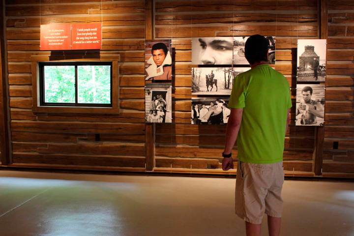 Ty Benner looks at a display in the gym at Fighter’s Heaven, Muhammad Ali’s train ...