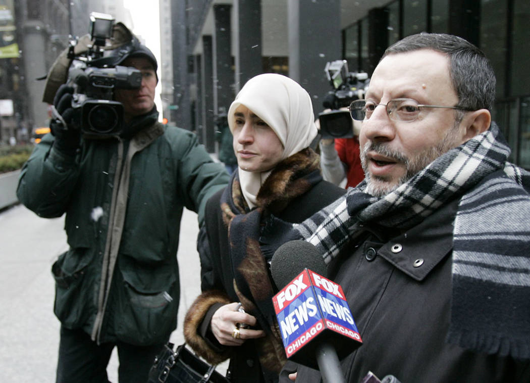 In this Feb. 1, 2007 file photo, Abdelhaleem Ashqar is surrounded by cameramen as he leaves fed ...