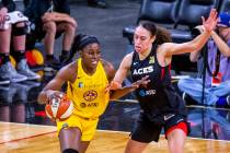 Los Angeles Sparks forward/center Chiney Ogwumike (13) drives the lane defended by Las Vegas Ac ...