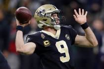 New Orleans Saints' Drew Brees throws during the first half the NFL football NFC championship g ...