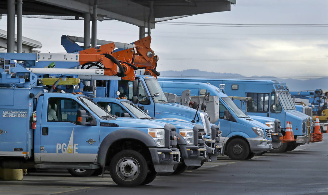 Pacific Gas & Electric vehicles are parked at the PG&E Oakland Service Center in Oakland, Calif ...