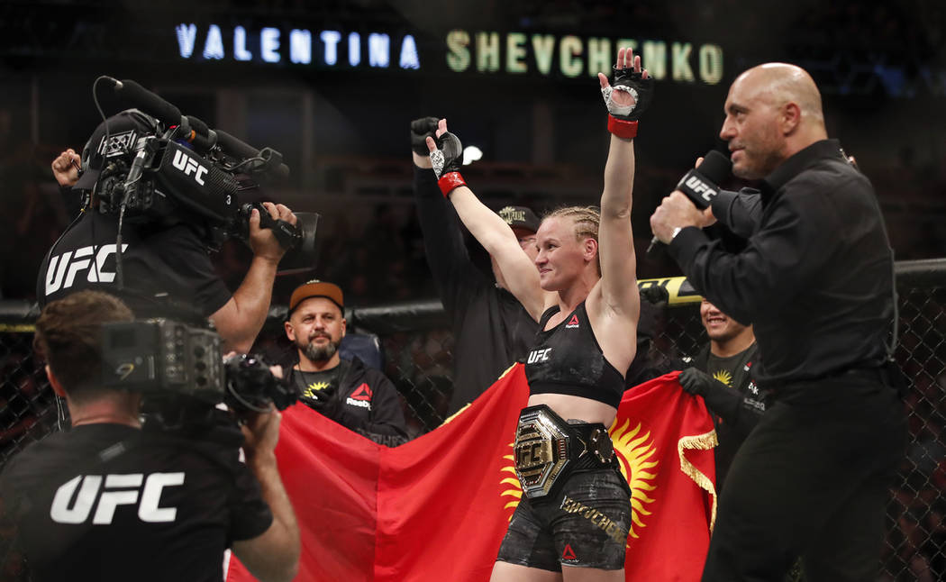 Valentina Shevchenko celebrates after defeating Jessica Eye during their women's flyweight titl ...