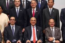 U.S. Treasury Secretary Steven Mnuchin, left bottom, and China's Finance Minister Liu Kun, righ ...