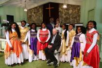 President Jimmy Carter has his picture taken with the Hayiya Dance Theatre, Inc. after they per ...