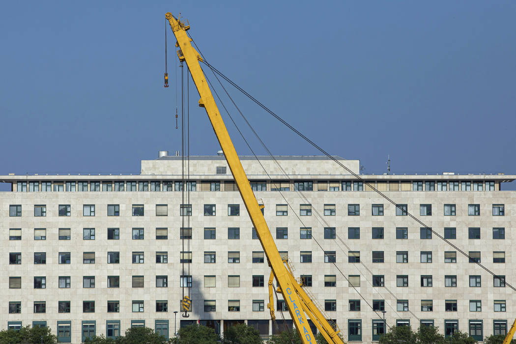 A 200-ton lift capacity 'Clark Adam" crane is stationed at Margaret Bridge, near the scen ...