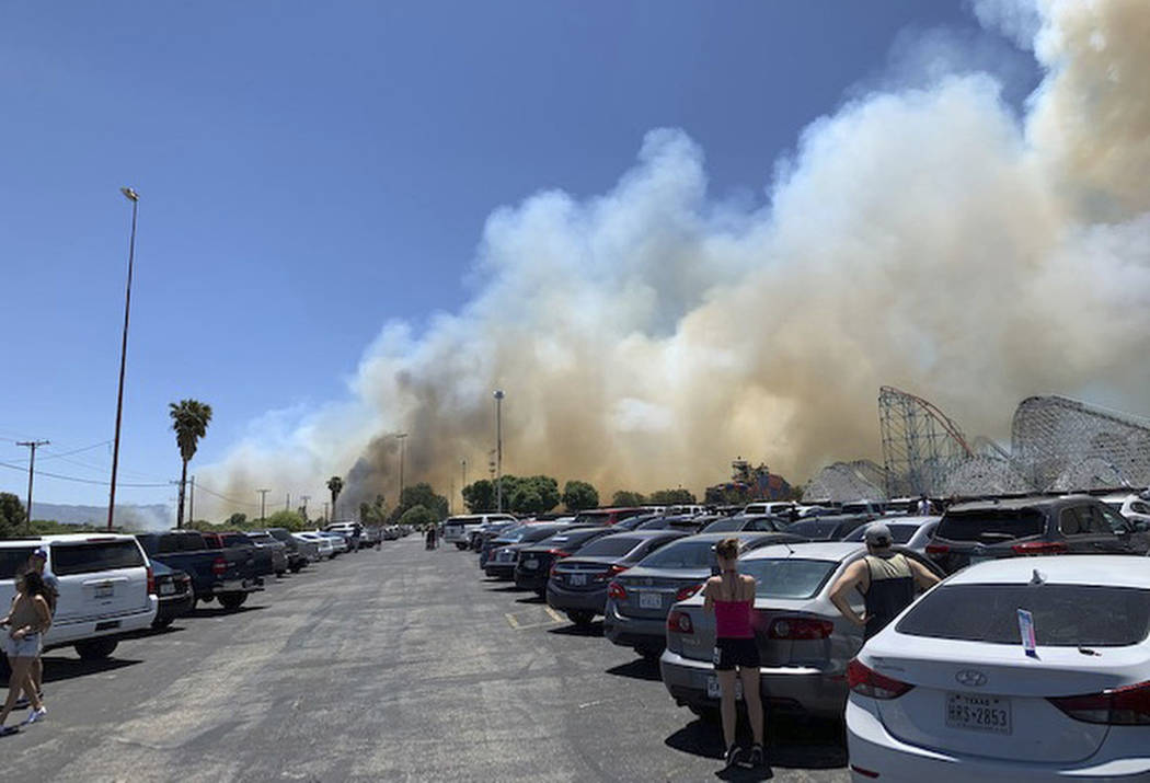 In this Sunday, June 9, 2019, photo provided by Joel Cannon, heavy smoke from a fast-moving bru ...