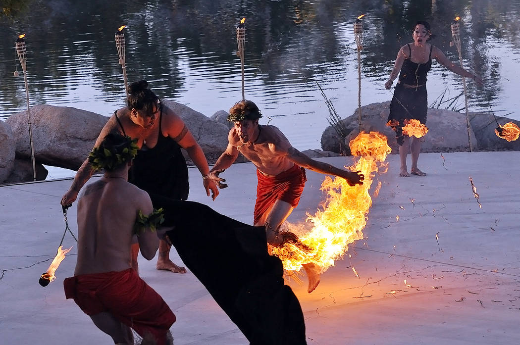 A fire dancer's costume catches fire while performing at a luau outside the Lakeside casino in ...