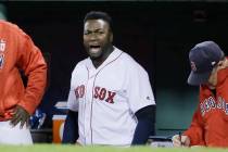 In this Oct. 10, 2016, file photo, Boston Red Sox designated hitter David Ortiz encourages the ...