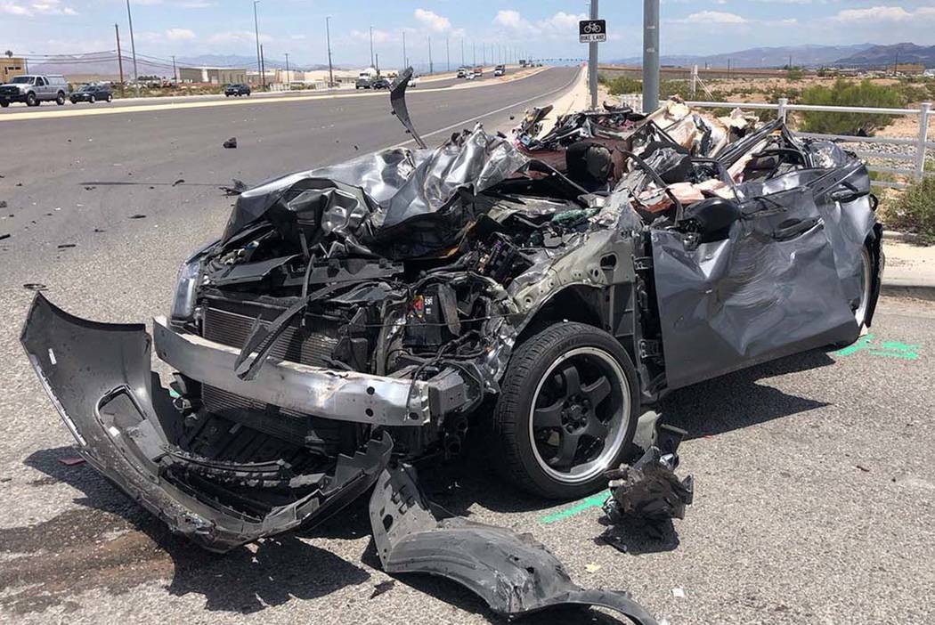 The Nevada Highway Patrol investigates a crash involving a semitrailer hauling double trailers ...