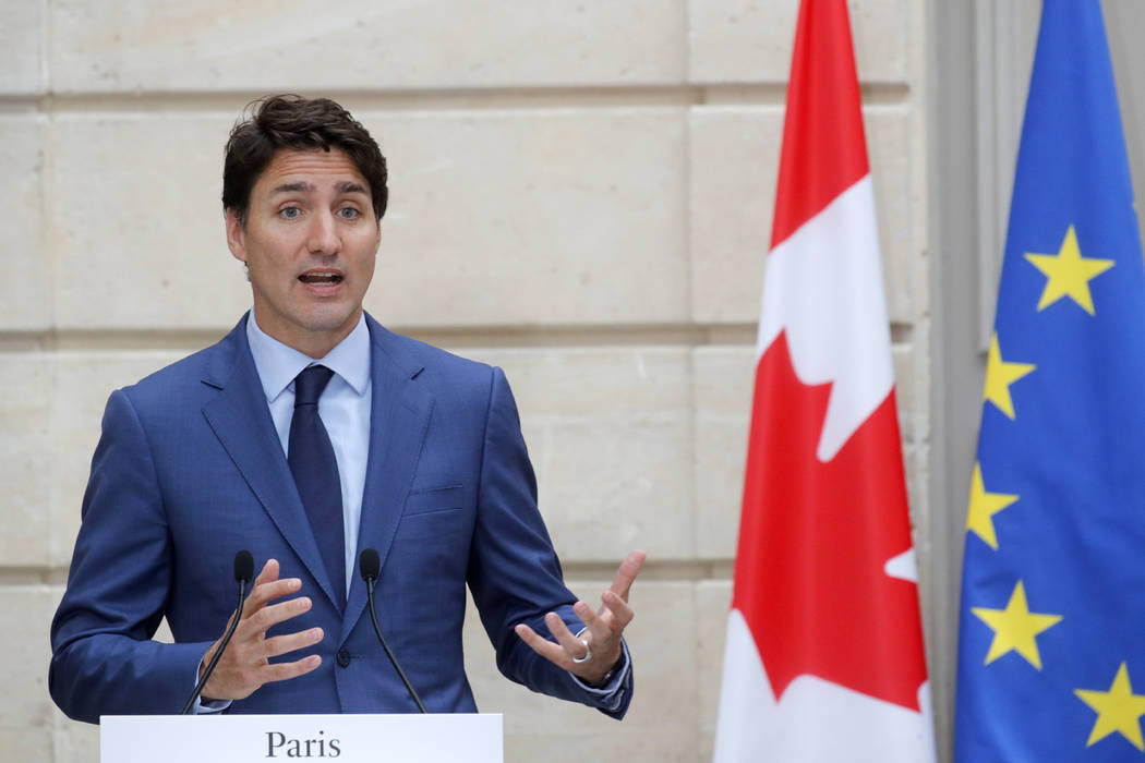 Canadian Prime Minister Justin Trudeau speaks during a joint press conference with French Presi ...
