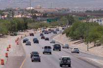 Traffic moves along Summerlin Parkway West of Buffalo Drive as construction takes place for a c ...