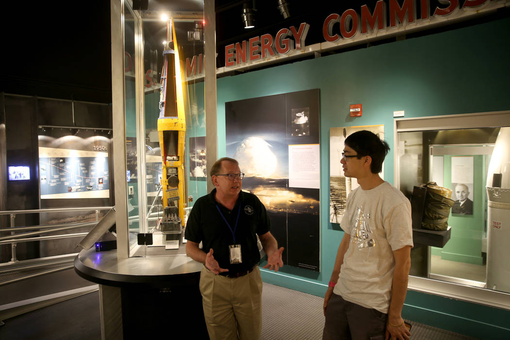 Executive Director Michael Hall of the National Atomic Testing Museum in Las Vegas, left, talks ...