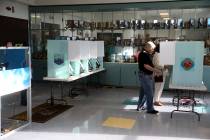 Andy and Terry Plourd of Las Vegas vote in the municipal election at Bonanza High School in Las ...