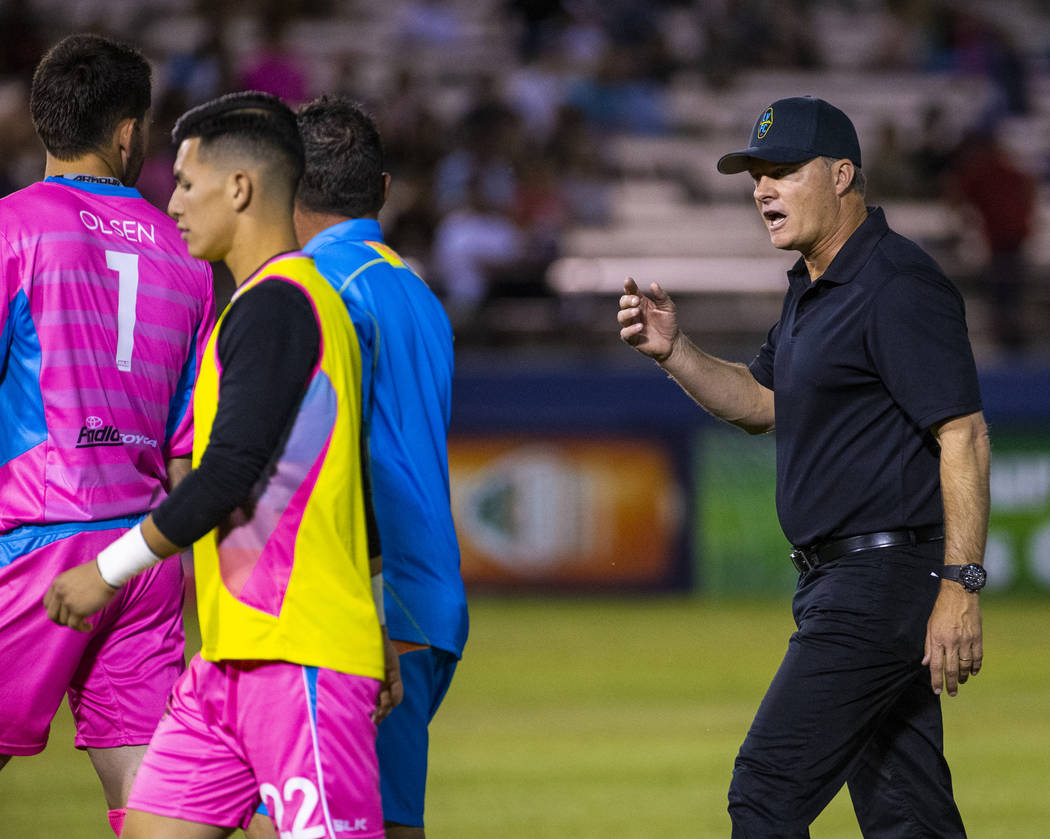 Las Vegas Lights FC goalkeeper Thomas Olsen (1) looks back and listens to head coach Eric Wynal ...