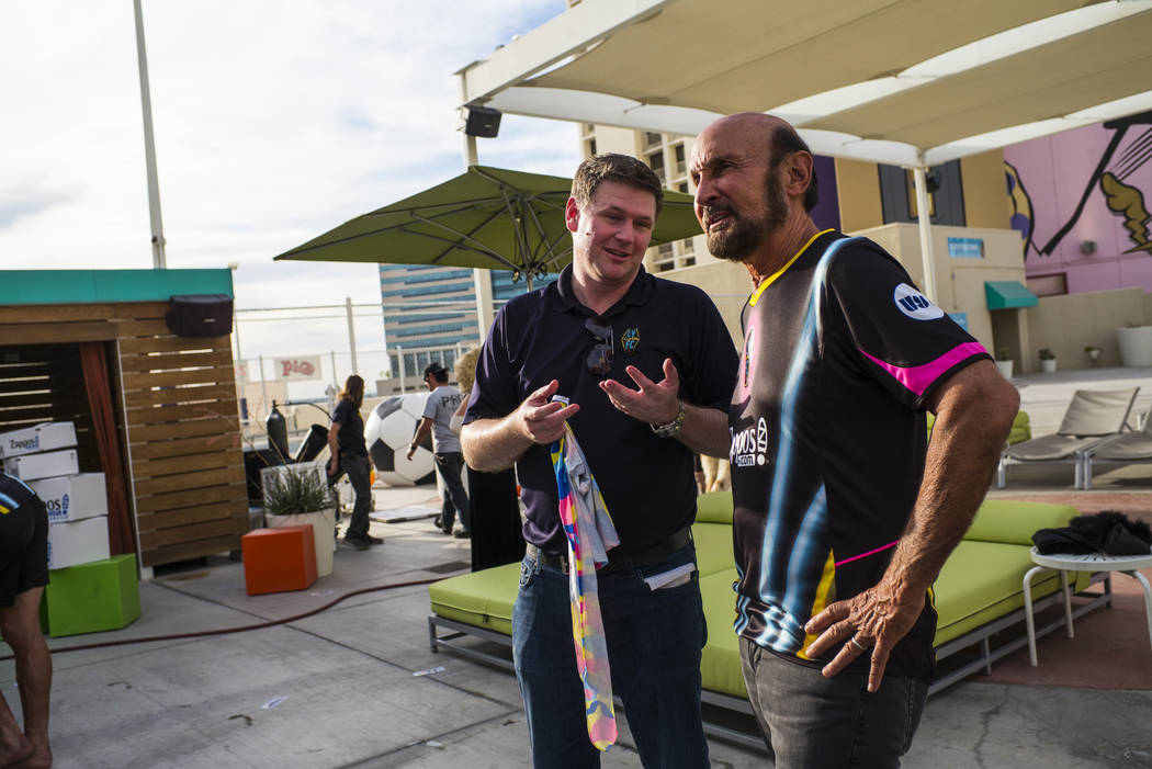 Brett Lashbrook, owner and CEO of Lights FC, left, talks with attorney Ed Bernstein ahead of th ...