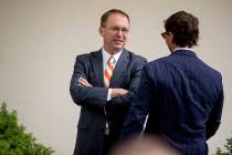 President Donald Trump's Chief of Staff Mick Mulvaney, left, speaks with Deputy White House pre ...