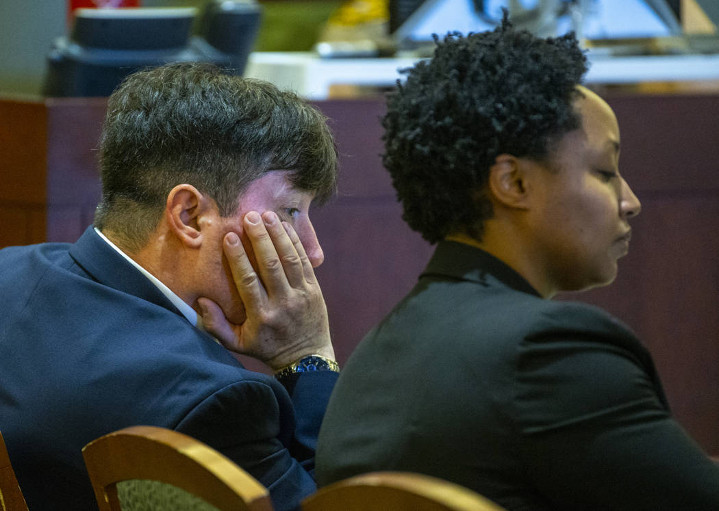 Dr. Mark Taylor listens to opening statements beside his lawyer Linda Rurangirwa during his tri ...