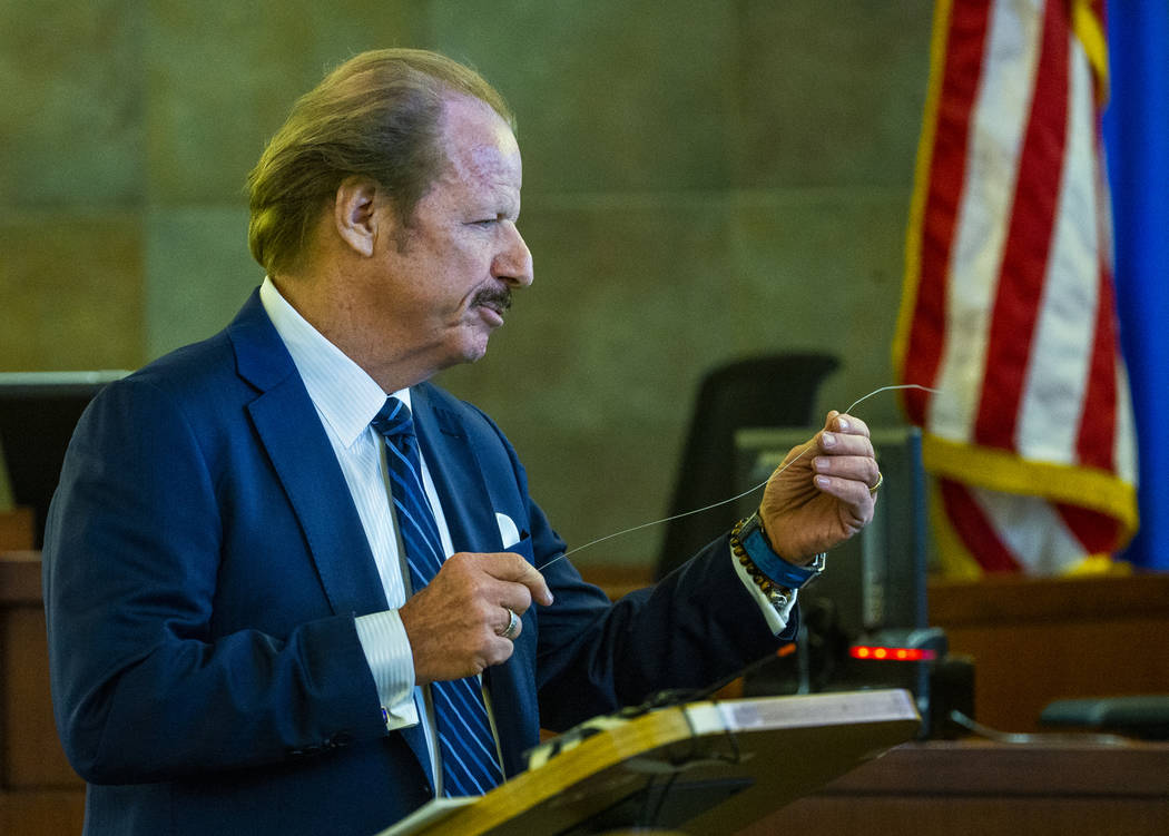 Plaintiff German Ortiz's lawyer James Jimmerson gives an opening statement to the jury while sh ...