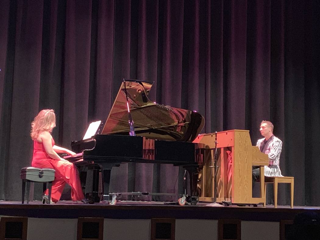 Maria “Masha” Pisarenko, left, performs a piano ballad with Dmytro Nehrych at the Summerlin ...