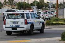A police vehicle blocks the street near Van Wagenen Street and South Major Avenue, close to the ...