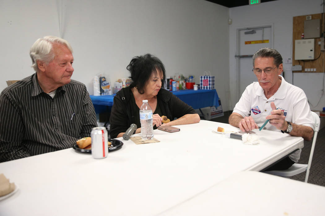 Bob Borgersen, left, with his wife, Vernie, talk to North Las Vegas Ward 4 incumbent councilman ...