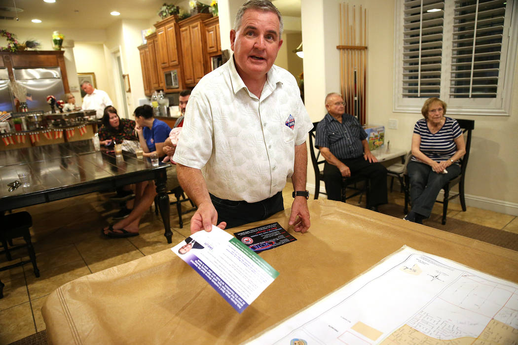 North Las Vegas Ward 4 candidate Pete Shields shows his campaign flyers at his home in North La ...