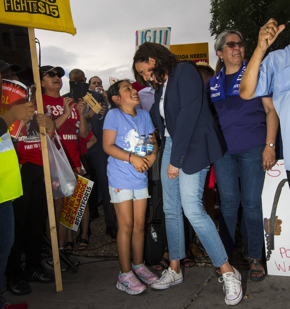 U.S. Sen. Kamala Harris, D-Calif., a Democratic presidential hopeful, talks with Allison Valenz ...