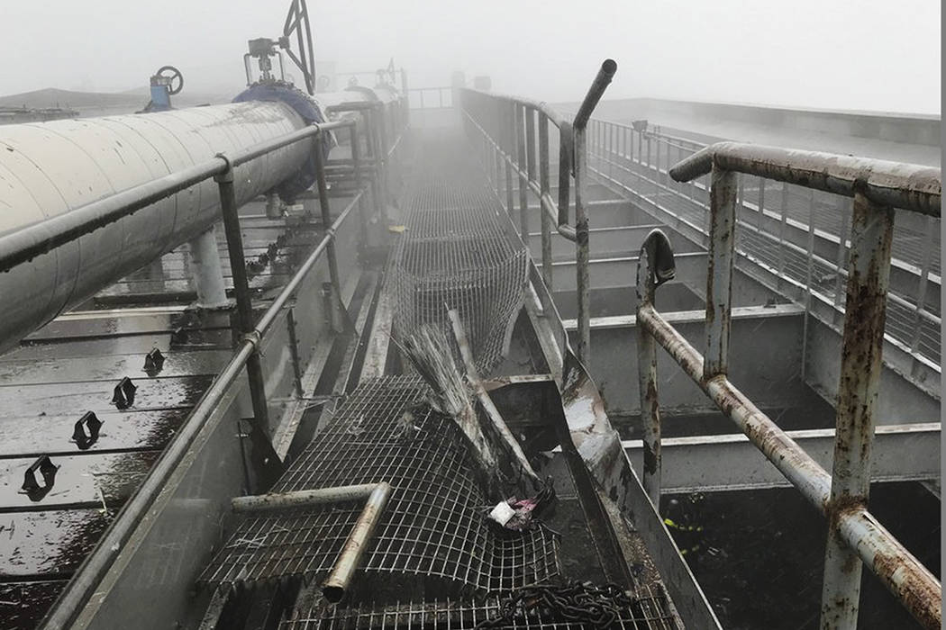 This photo released by the New York City Fire Department shows damage caused by a helicopter cr ...