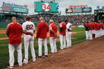 The Boston Red Sox and fans pause for a moment for former Red Sox designated hitter David Ortiz ...