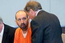 In a March 14, 2017, file photo, Craig Hicks, center, charged with the murder of three Muslim s ...