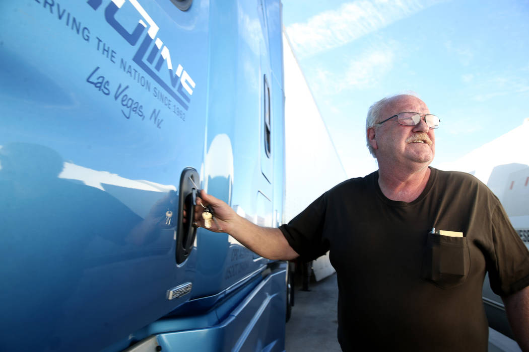 Tony Serpe, a driver trainer with Truline Corporation, prepares to move his rig at his trucking ...