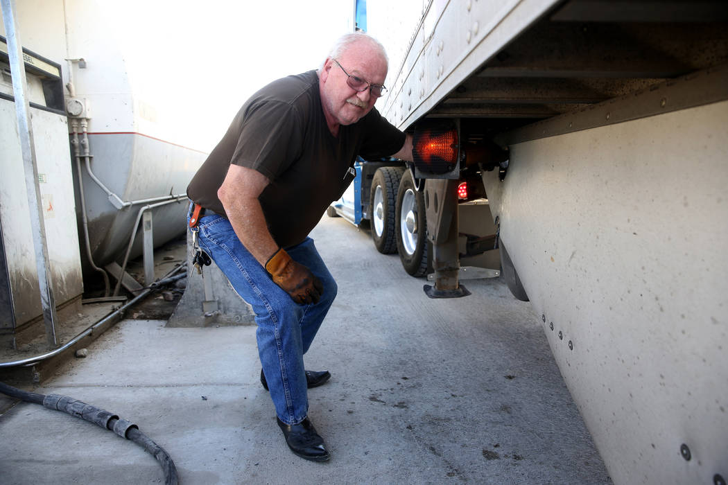 Tony Serpe, a driver trainer with Truline Corporation, prepares to move his rig at his trucking ...