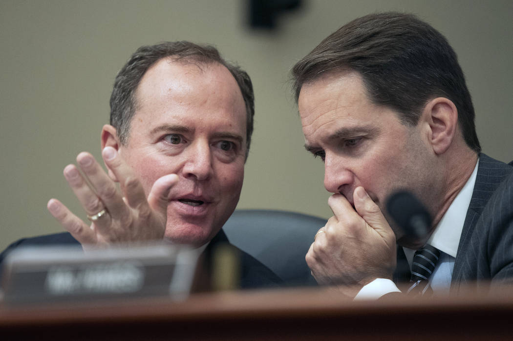 House Permanent Select Committee on Intelligence Chairman Adam Schiff of Calif. left, talks to ...