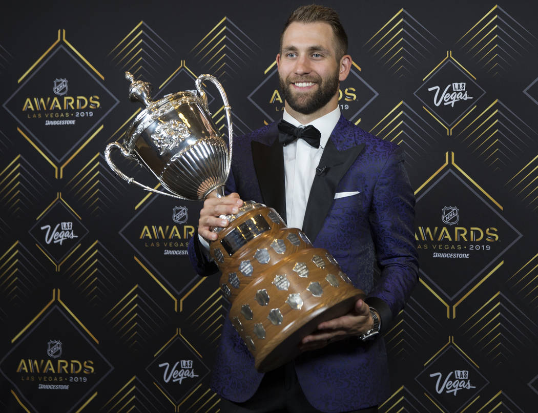 Minnesota Wild left wing Jason Zucker, a Las Vegas native, holds the King Clancy Memorial Troph ...