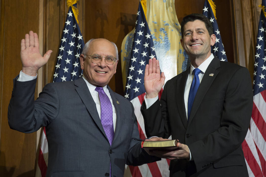 House Speaker Paul Ryan of Wis. administers the House oath of office to Rep. Paul Tonko, D-N.Y. ...