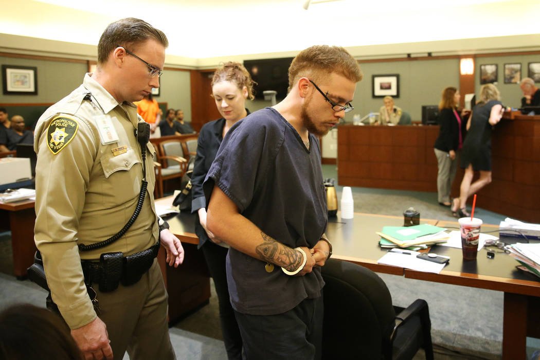 Jon Kennison is escorted out of the courtroom after pleading not guilty to a murder charge in t ...