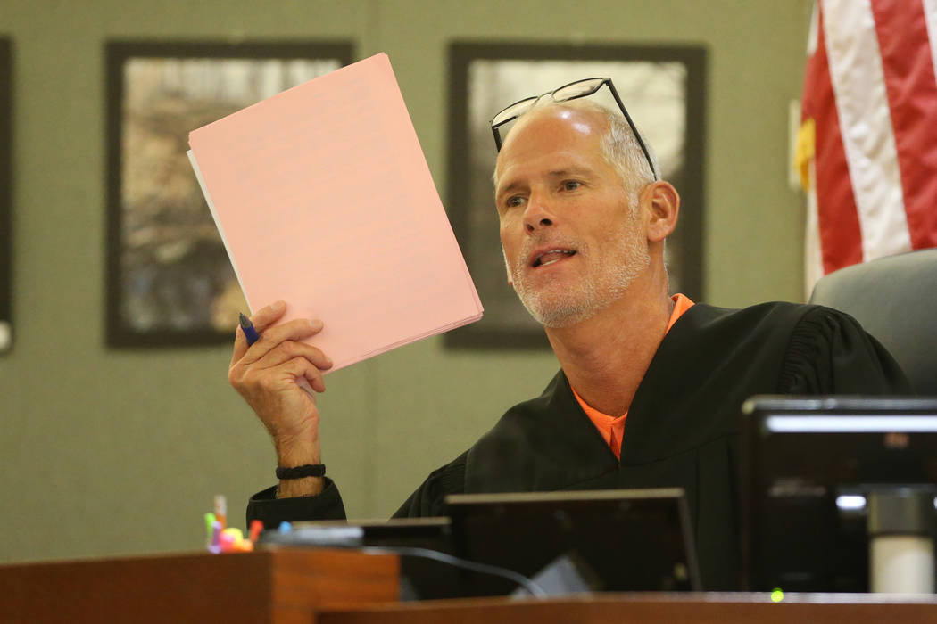 District Judge Douglas Herndon speaks during a court hearing for Jon Kennison and Kelsey Turne ...