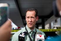 Las Vegas police homicide Capt. Jason Letkiewicz answers questions from the media during a brie ...